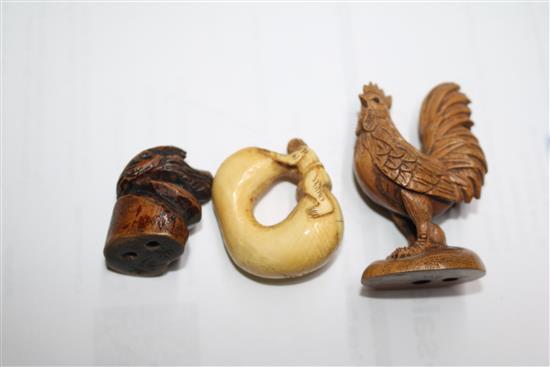Four Japanese netsuke: one bronze, a cockerel, a dragon and figure on a gourd
